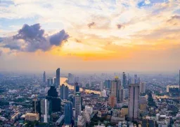 Bangkok cityscape at sunset with dramatic sky